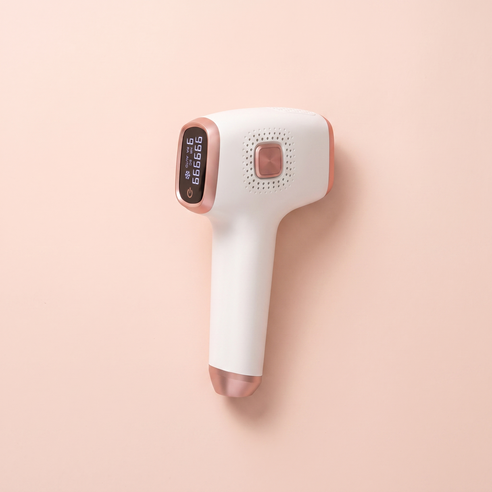 IPL Ice-Cooling Laser Hair Removal Handset — peach editorial product photo