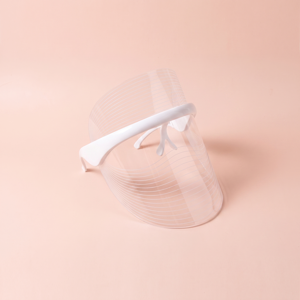 7-Colour LED Red-Light Therapy Face Mask — peach editorial product photo
