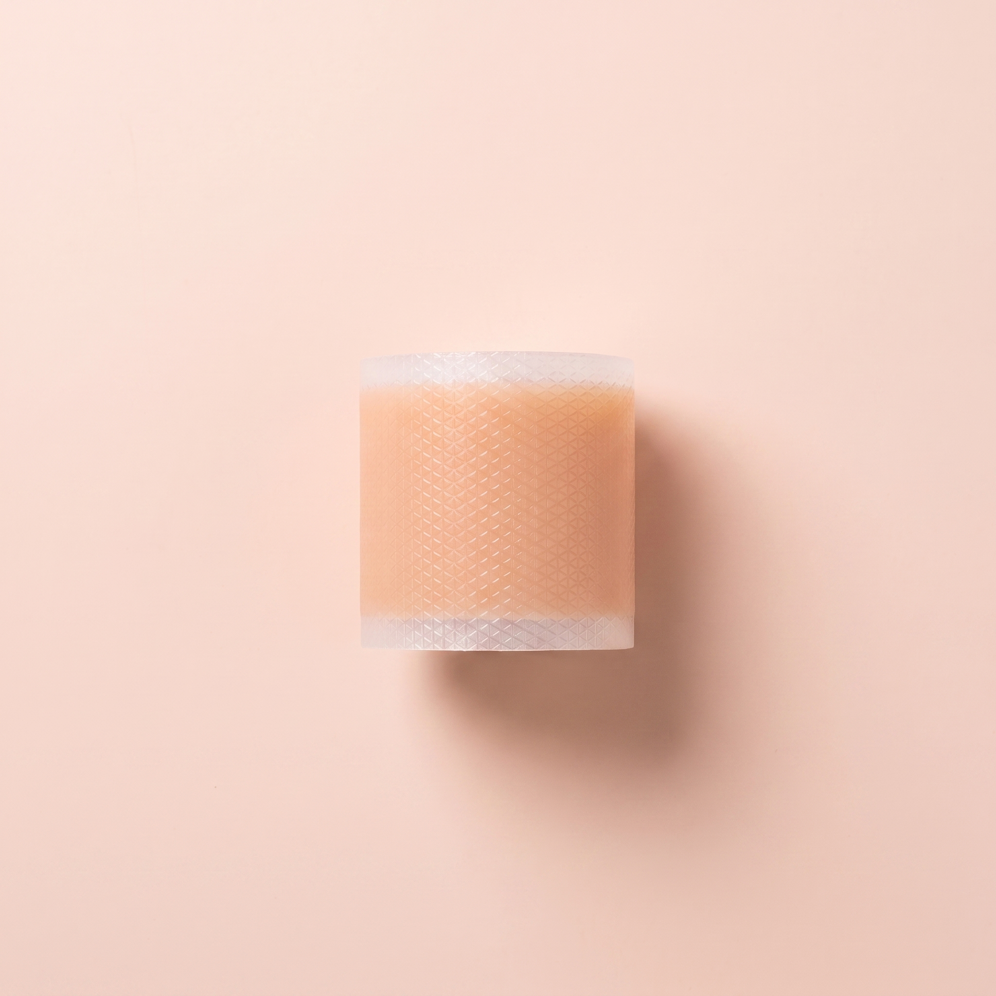 Silicone Scar Sheets — peach editorial product photo