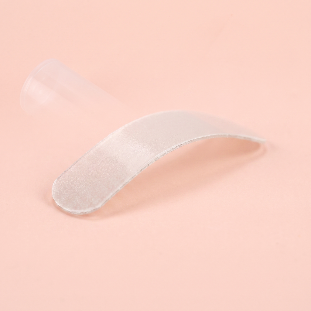 Ingrown Toenail Corrector Patch Kit — close-up of a corrector patch on peach background
