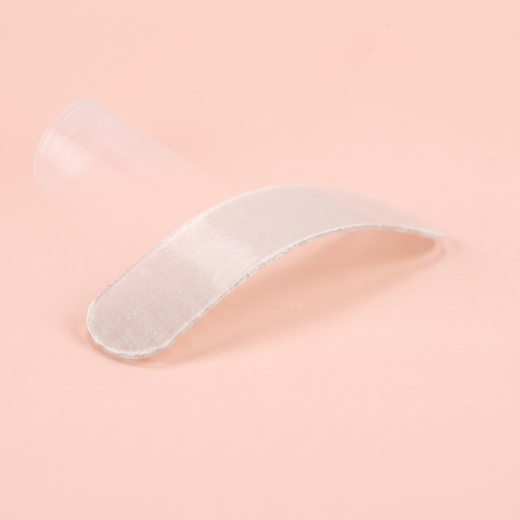 Ingrown Toenail Corrector Patch Kit — close-up of a corrector patch on peach background