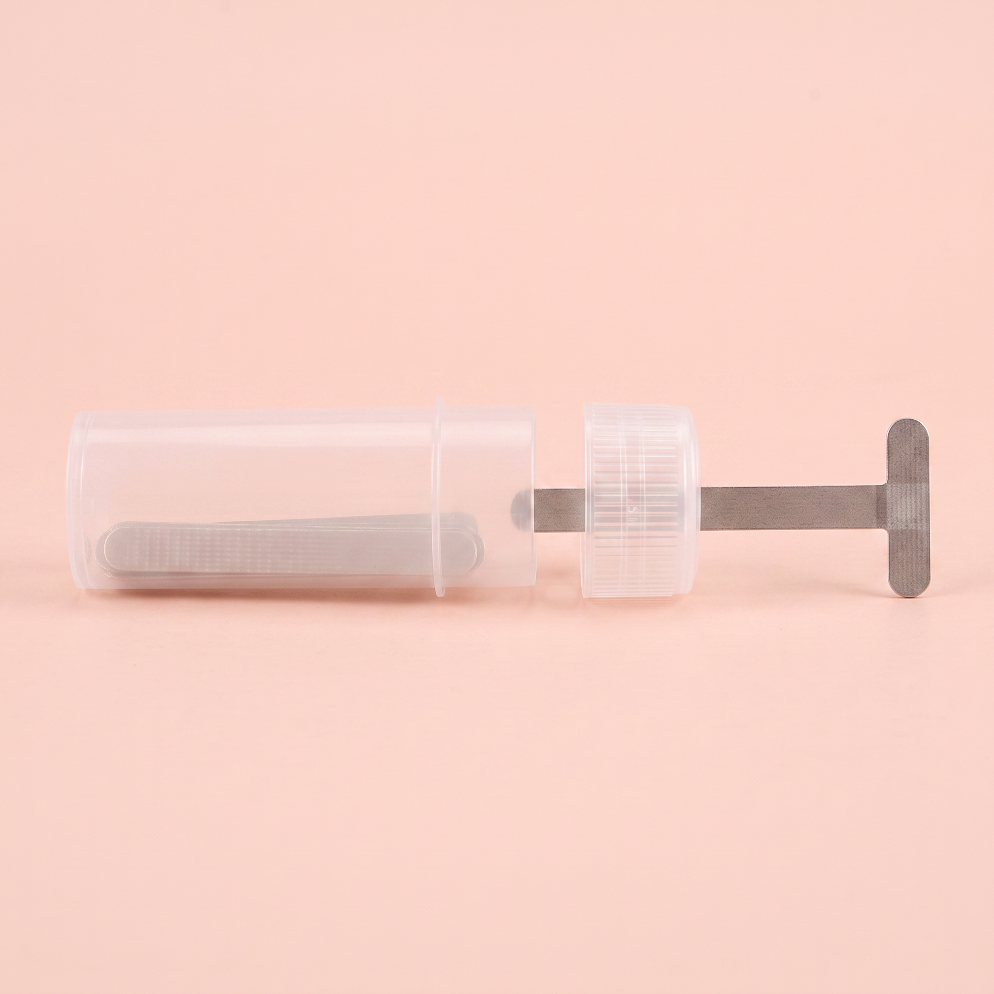 Ingrown Toenail Corrector Patch Kit — side profile view on peach background