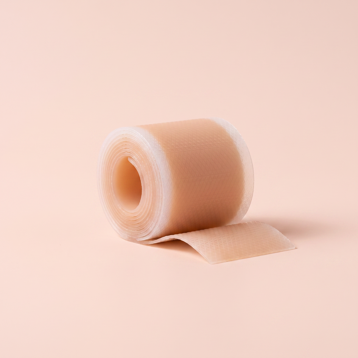 Silicone Scar Sheets — side profile view on peach background
