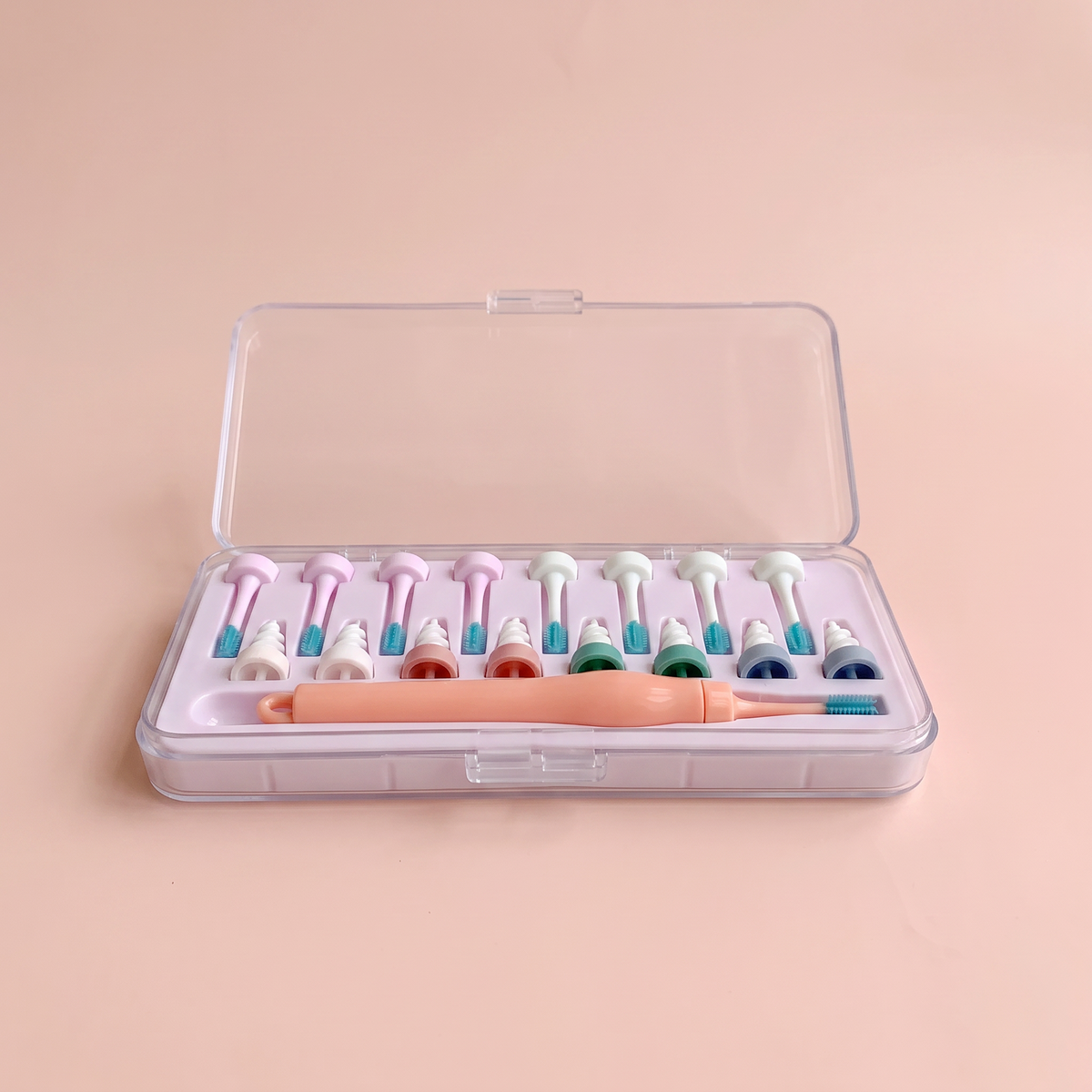 Spiral Ear Wax Remover — front three-quarter view on peach background