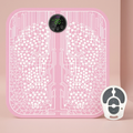 EMS Foot Massager Mat on blush-pink studio backdrop